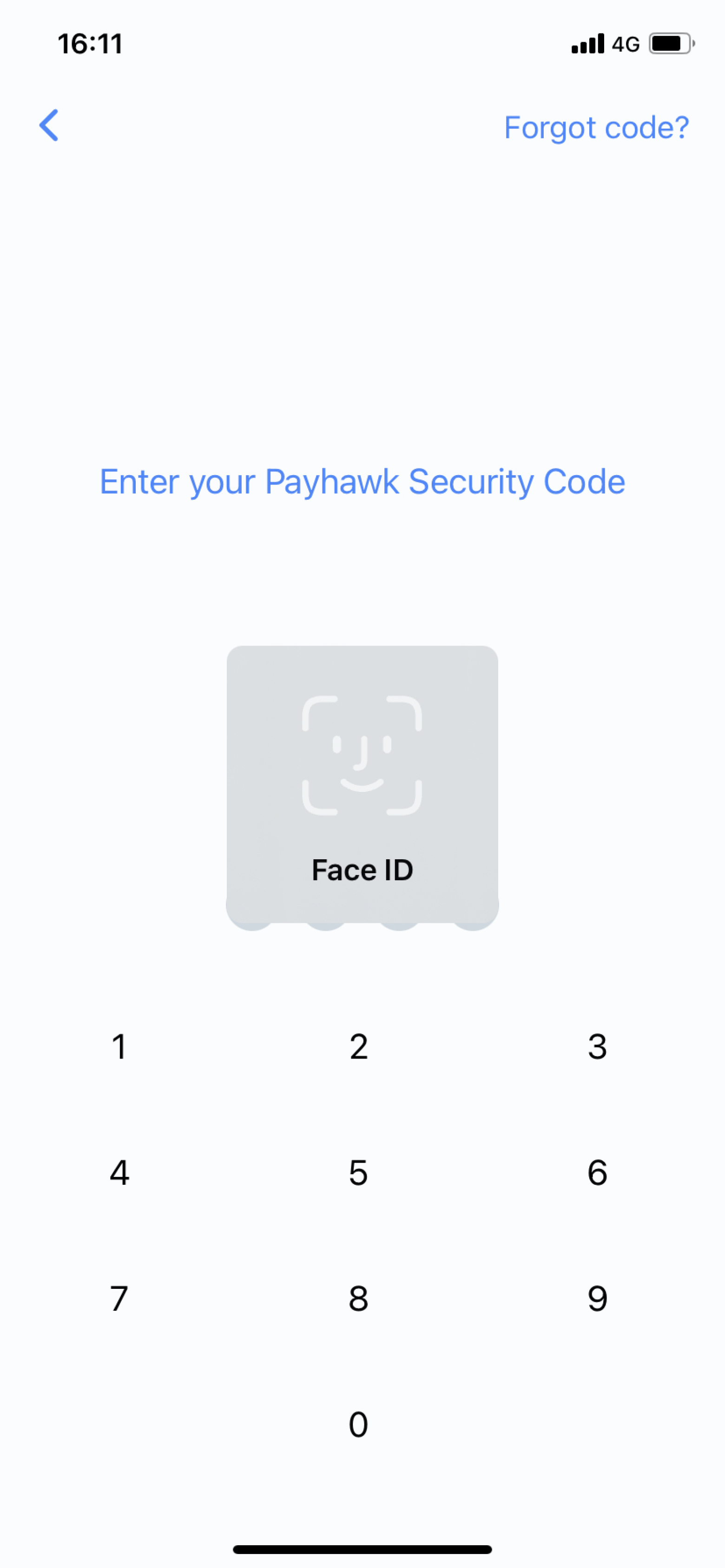 The Payhawk mobile app screen requiring the input of Face ID biometric data to authenticate.