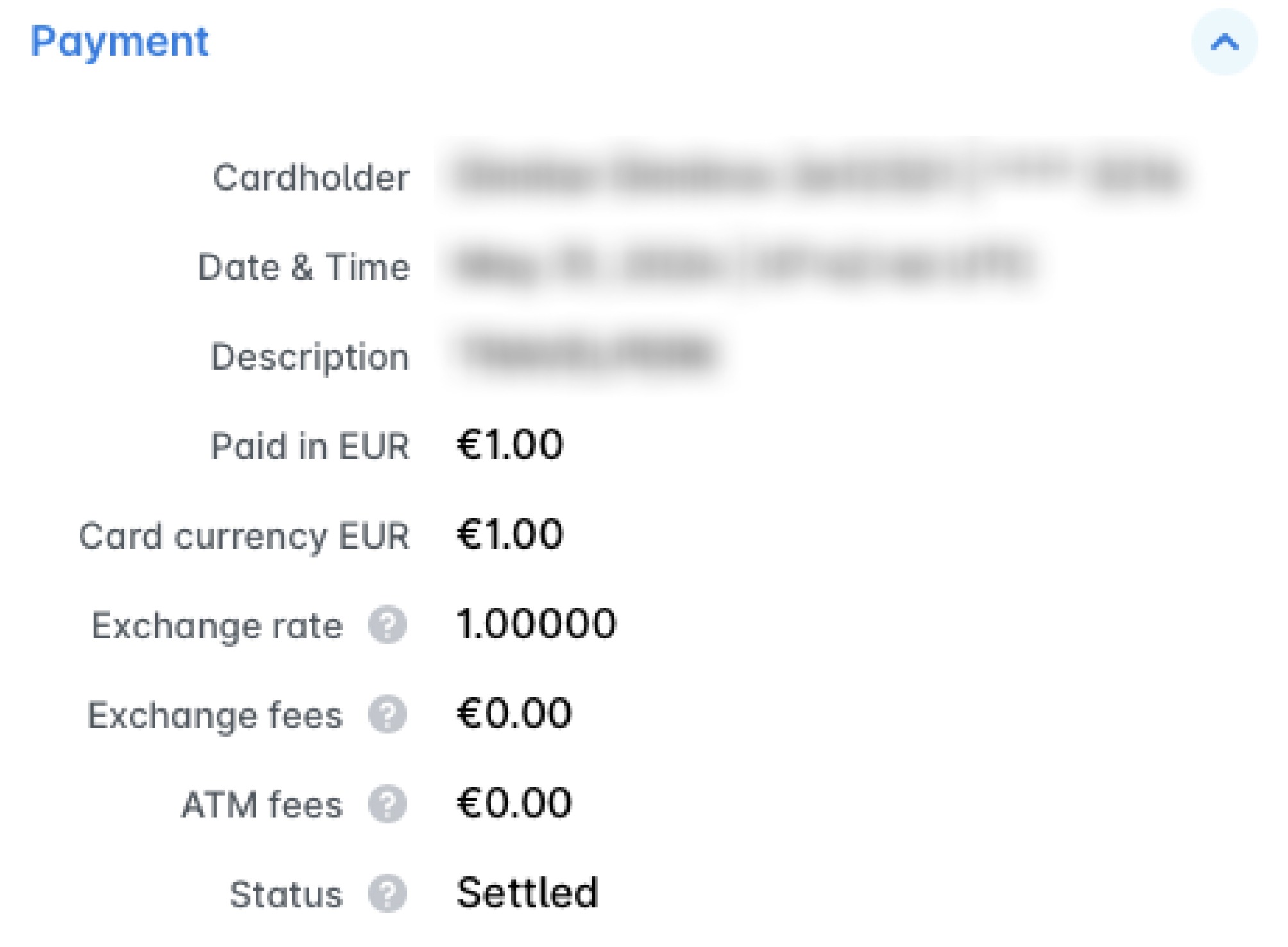 Payment section of an expense showing the paid amount, exchange rate, exchange fees, ATM fees, and status.