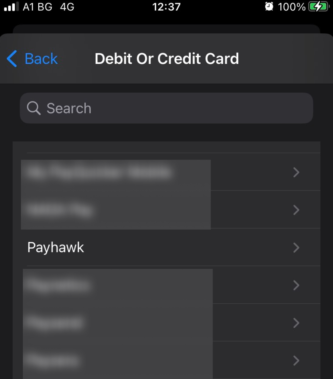 Debit or Credit Card list in Apple Wallet with Payhawk among the card issuers.