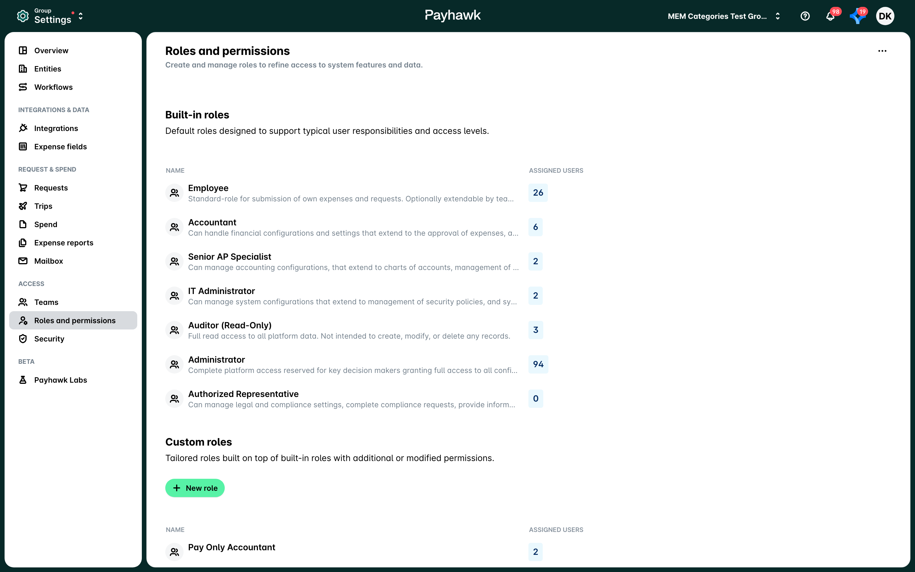 Group Settings > Roles and permissions with the built-in roles and their assigned users.
